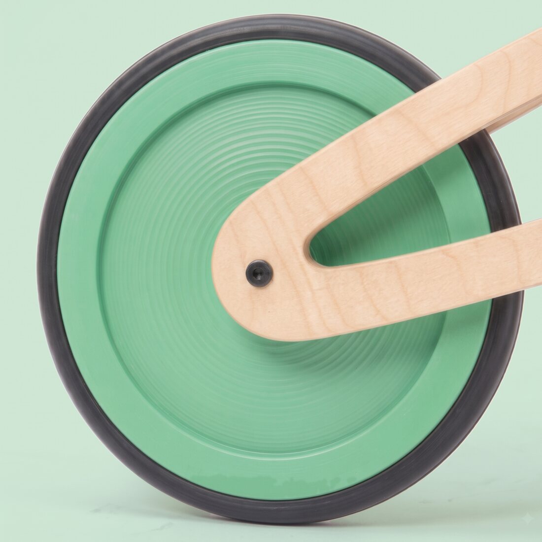 A Tochak wheel painted green across the whole disc, with the Tochak mark branded on it.